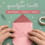 Ensemble d'enveloppes DIY colorées sur une table de bricolage.